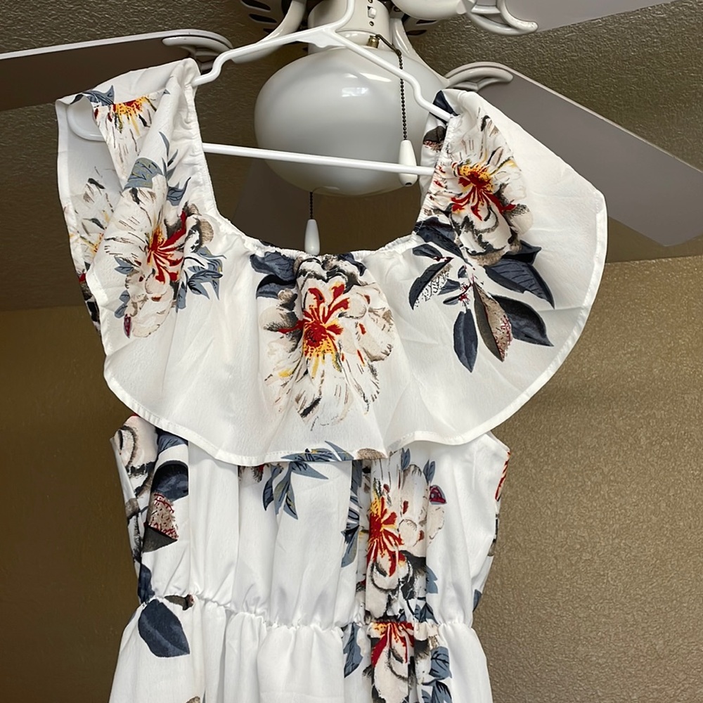 Floral, floor length over the shoulder dress.